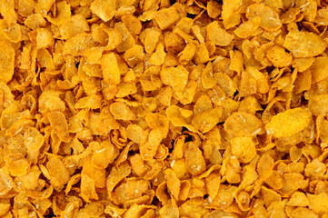 Honey and nut corn flakes breakfast cereal background