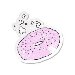 retro distressed sticker of a cartoon bagel