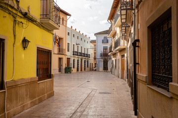 Obraz premium Empty old town street view in Canals, Spain.