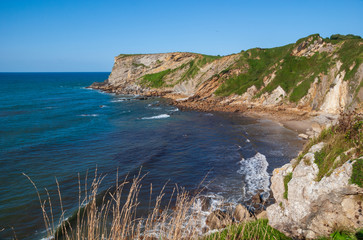 Cliff landscape over the sea on a summer afternoon