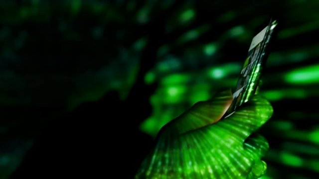 Creative abstract digital visualization projecting on human hand during using smartphone.