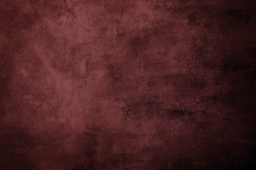 Reddish grungy distressed canvas bacground