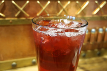 Beautiful delicious cranberry juice cocktail alcohol in glass with ice cube white foam jam jar beverage summer time in party lemonade gin tequila on wooden table ice cold glass  