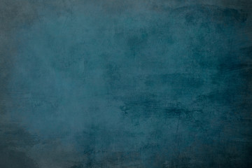 Fototapeta na wymiar Dark blue grungy distressed canvas bacground