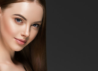 Naklejka premium Beauty woman face hair skin healthy closeup over gray background