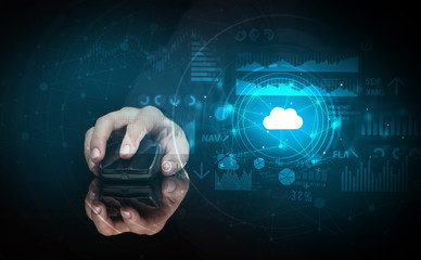 Hand using wireless mouse with cloud technology concept and dark background