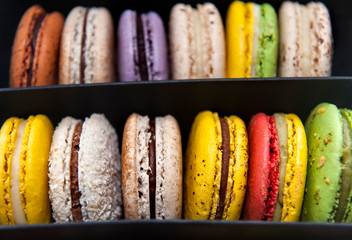 close up of colorful macaroons as background