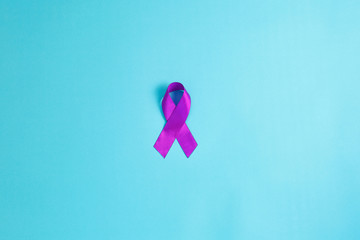 Purple ribbons on blue background, Alzheimer disease, Pancreatic cancer, Epilepsy awareness, domestic violence awareness,