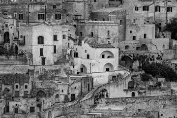 Amazing close-up black and white view of ancient town of Matera, the Sassi di Matera, Basilicata, Southern Italy, architectural details and buildings on many levels