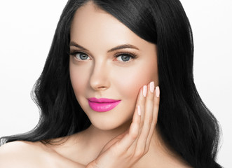 Brunette woman with long black hair and pink lipstick lips, female with beautiful eyes with lash extensions 