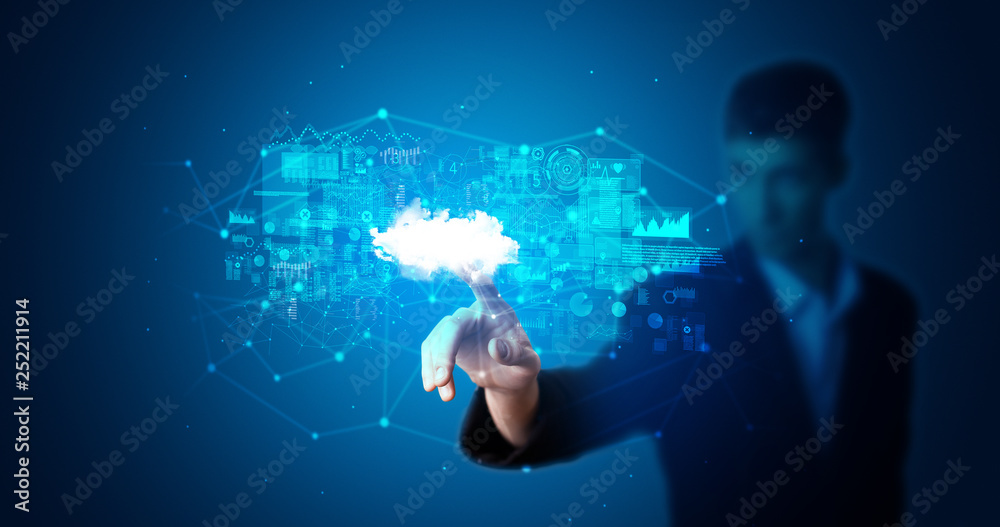 Aufkleber Man touching hologram projection displaying information from cloud based system
