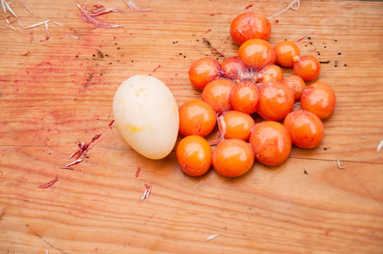 Fully developed yolks before the process of shell formation. Unfinished eggs, yolks taken out from a killed hen.