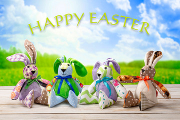 Easter bunnies family with happy easter inscription.