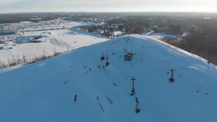 Snow park in Wisconsin, winter activities (tubing, skiing, snowboarding). Drone shots , bird's eyes view