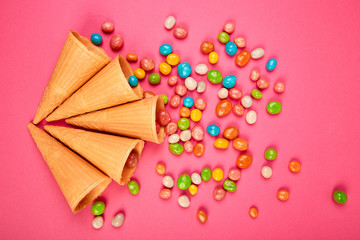 Ice cream waffles cones with colorful candy