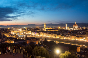 Obraz premium FLORENCE in Italy with the dome and Palazzo della Signoria and arno river