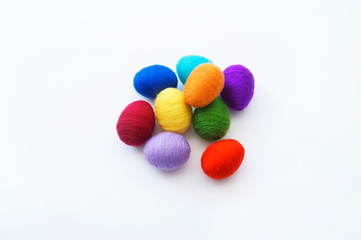 Easter eggs knitted from wool. Manual work. Rainbow. Easter.