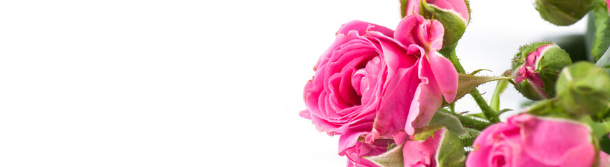 Obraz premium Fresh flowers on wood desk.