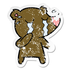 distressed sticker of a cartoon crying bear