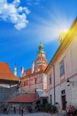 Fototapeta premium Beautiful sunset over historic centre of Chesky Krumlov old town in the South Bohemian Region of the Czech Republic on Vltava River. UNESCO World Heritage Site