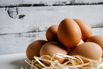 A lot of chicken eggs on the table