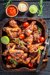 Grilled chicken leg with rosemary and spices