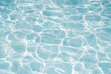 Texture of water in swimming pool for background