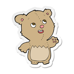 sticker of a cartoon happy little teddy bear