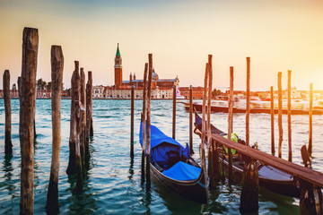Traditional gondola in Venice at sunset