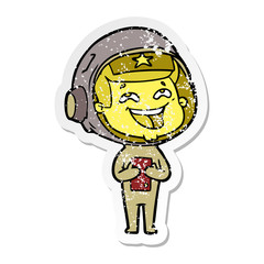 distressed sticker of a cartoon laughing astronaut