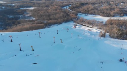 Snow park in Wisconsin, winter activities (tubing, skiing, snowboarding). Drone shots , bird's eyes view