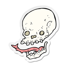 sticker of a cartoon spooky skull