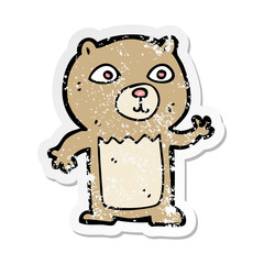 retro distressed sticker of a cartoon waving teddy bear