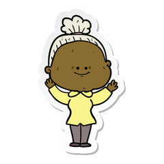 sticker of a cartoon happy old woman