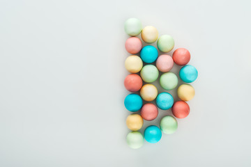 top view of colorful easter eggs isolated on grey