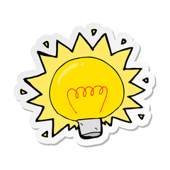 sticker of a cartoon electric light bulb