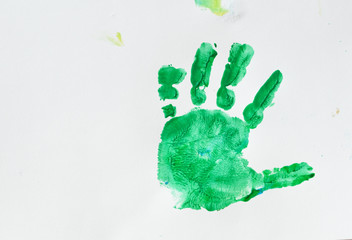 Colorful hand prints of toddler kid on white background. Set of rainbow colored hand prints.