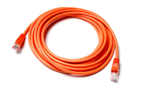 Isolated orange patch cord internet cable on white background
