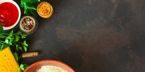 dough ingredients set and filling, sauce (flour, olives, greens and more). food background. copy...