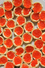 Sandwiches with red caviar
