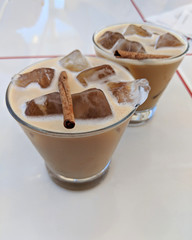 ice coffee in glasses closeup on white background
