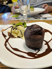 fondan with dark chocolate and ice-cream in restaurant