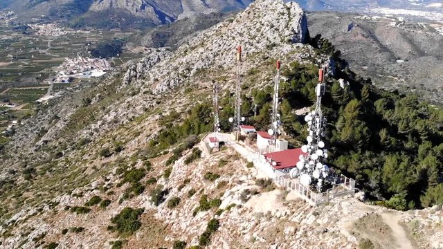 Segaria 21Aerial drone view of telecommunication antennas in Segaria mountain, in Marina Alta, Alicante, Spain
