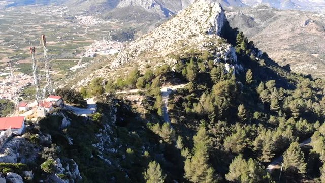 Aerial drone view of telecommunication antennas in Segaria mountain, in Marina Alta, Alicante, Spain