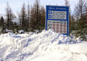 Czech republic traffic information welcome sign in the deep snow