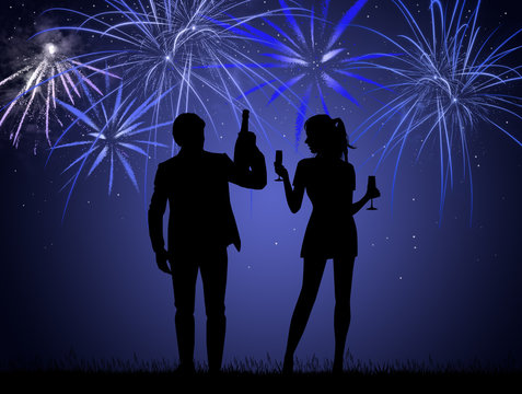 couple celebrate the New Year in the pyrotechnic fireworks