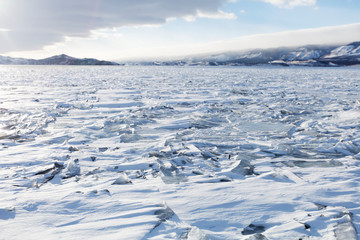 Fototapeta na wymiar Lake Baikal landscape. Ice and snow