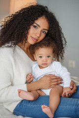 Love of a mother and baby. Family at home. Lifestyle