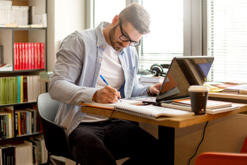 Male student in library