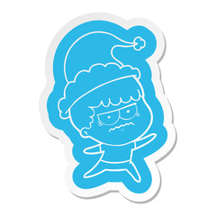 cartoon  sticker of a annoyed man wearing santa hat